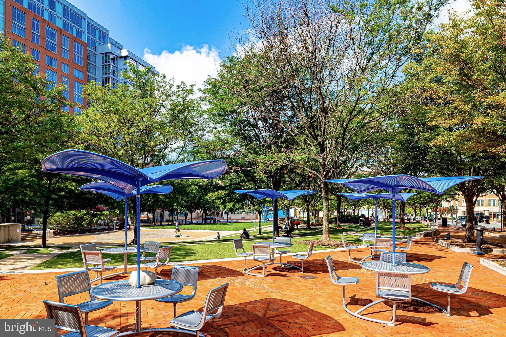 12000 Market Street, Unit 445 Reston, VA 20190 - Photo 47 of 51 a view of a swimming pool with outdoor seating space