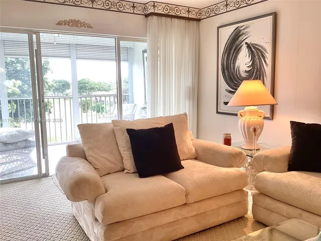 a living room with a couch and a table