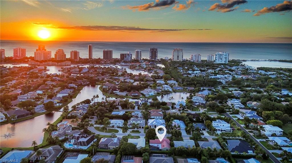 4870 Whispering Pine Way Naples, FL 34103 - Photo 2 of 43 a view of a city