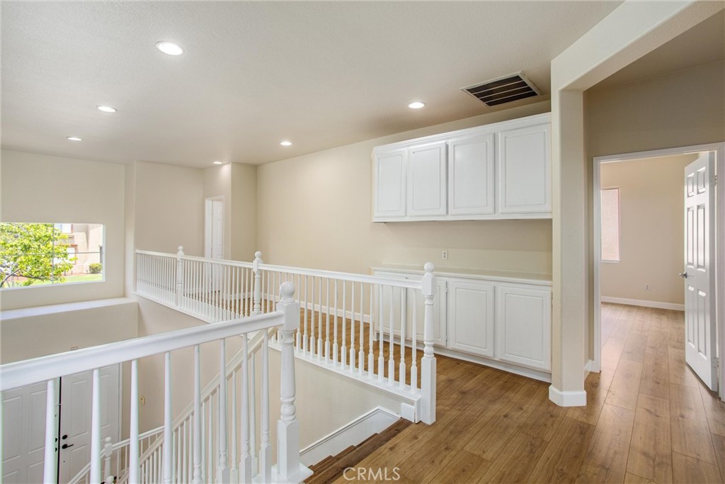 19429 Norwich Drive Riverside, CA 92508 - Photo 25 of 45 a view of hallway with wooden floor