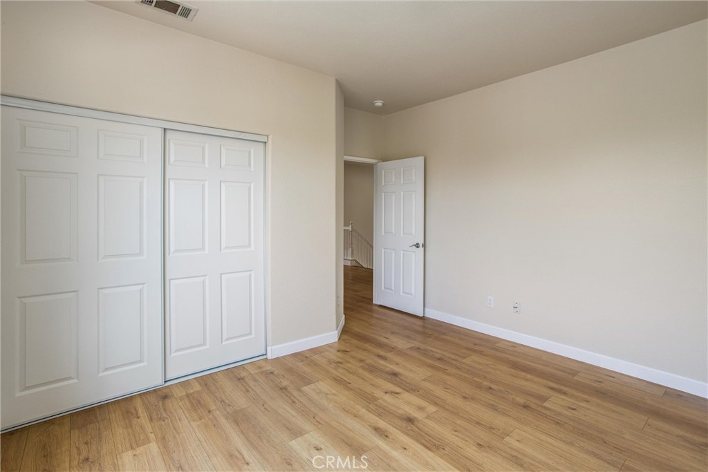 19429 Norwich Drive Riverside, CA 92508 - Photo 34 of 45 a view of an empty room and wooden floor