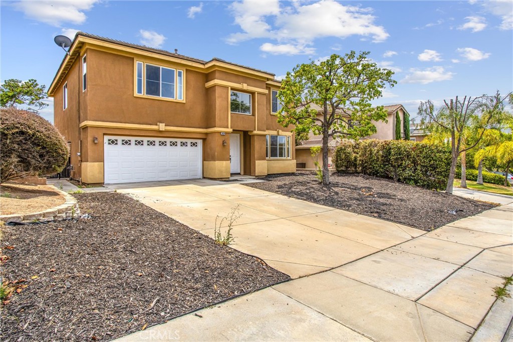 19429 Norwich Drive Riverside, CA 92508 - Photo 43 of 45 a view of a street with a building in the background