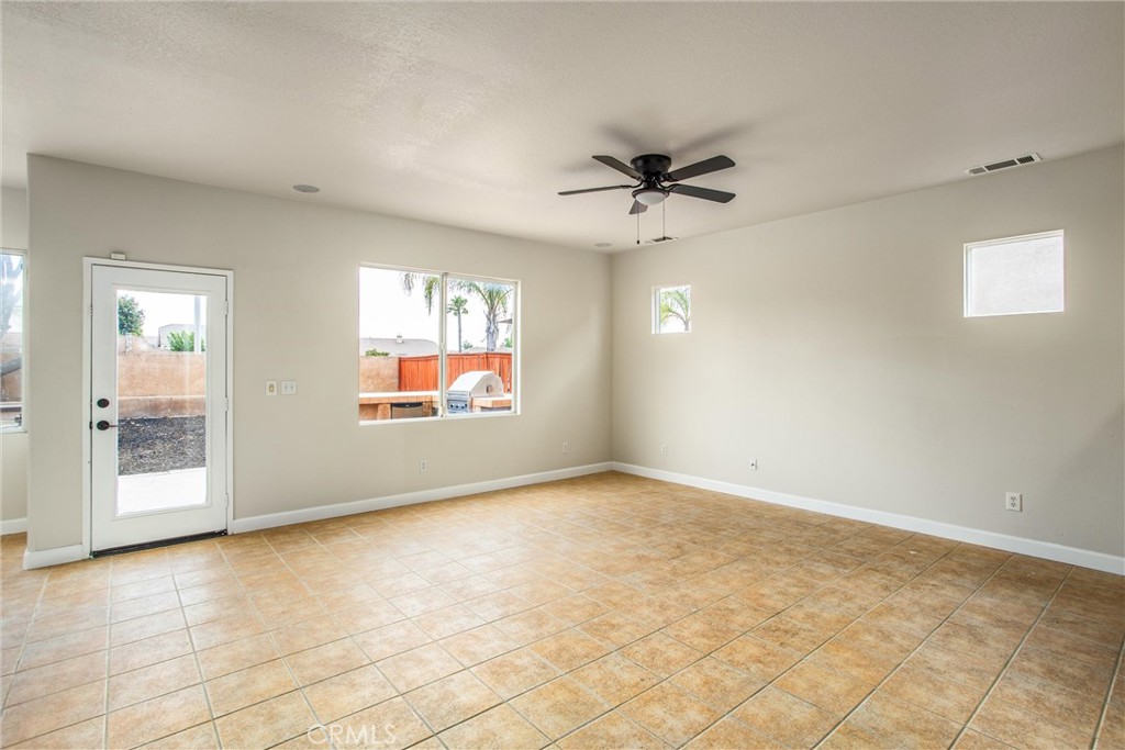 19429 Norwich Drive Riverside, CA 92508 - Photo 9 of 45 a view of an empty room with a window