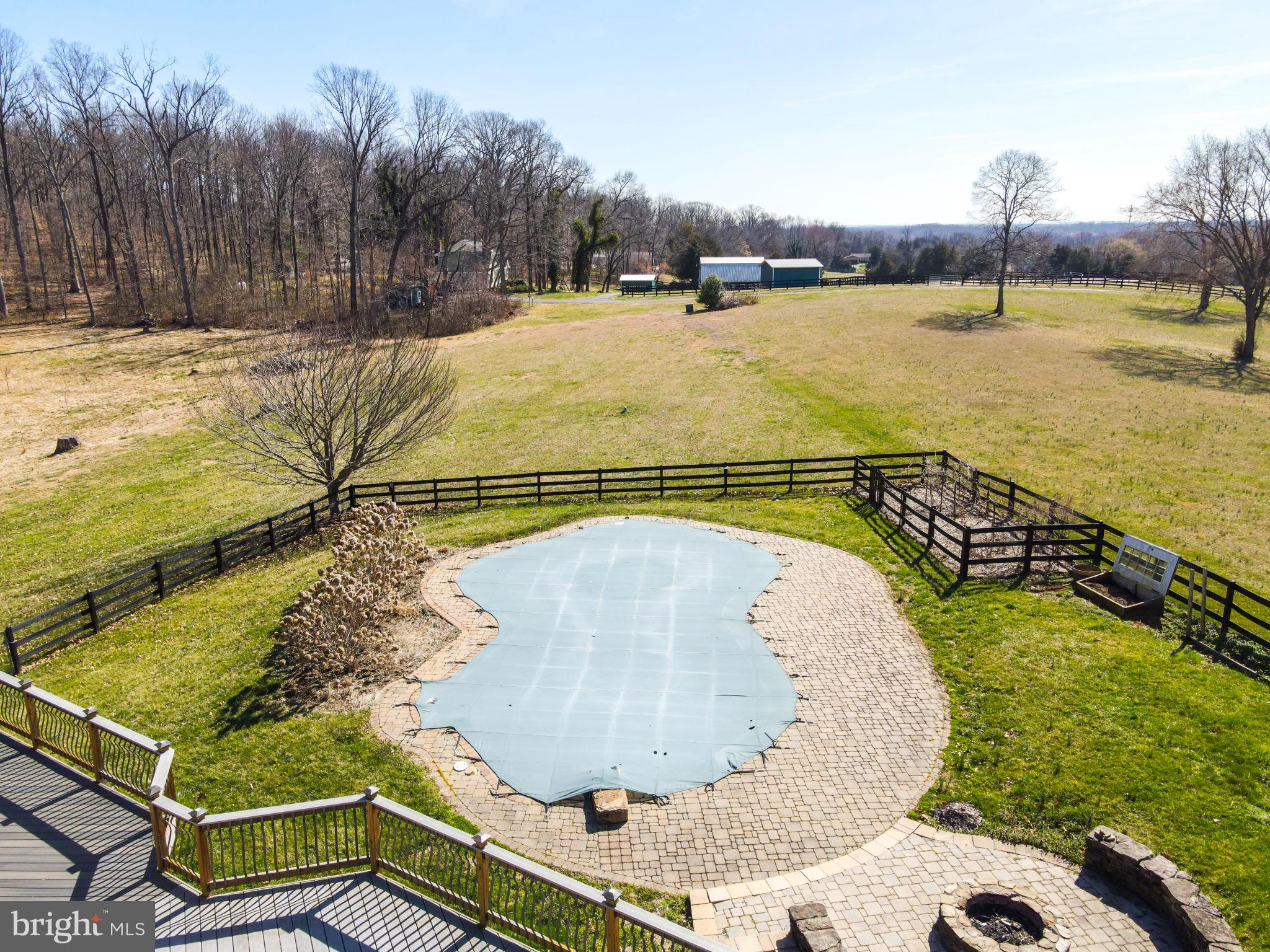 6239 Beverleys Mill Road Broad Run, VA 20137 - Photo 48 of 70 fenced backyard with pool and firepit