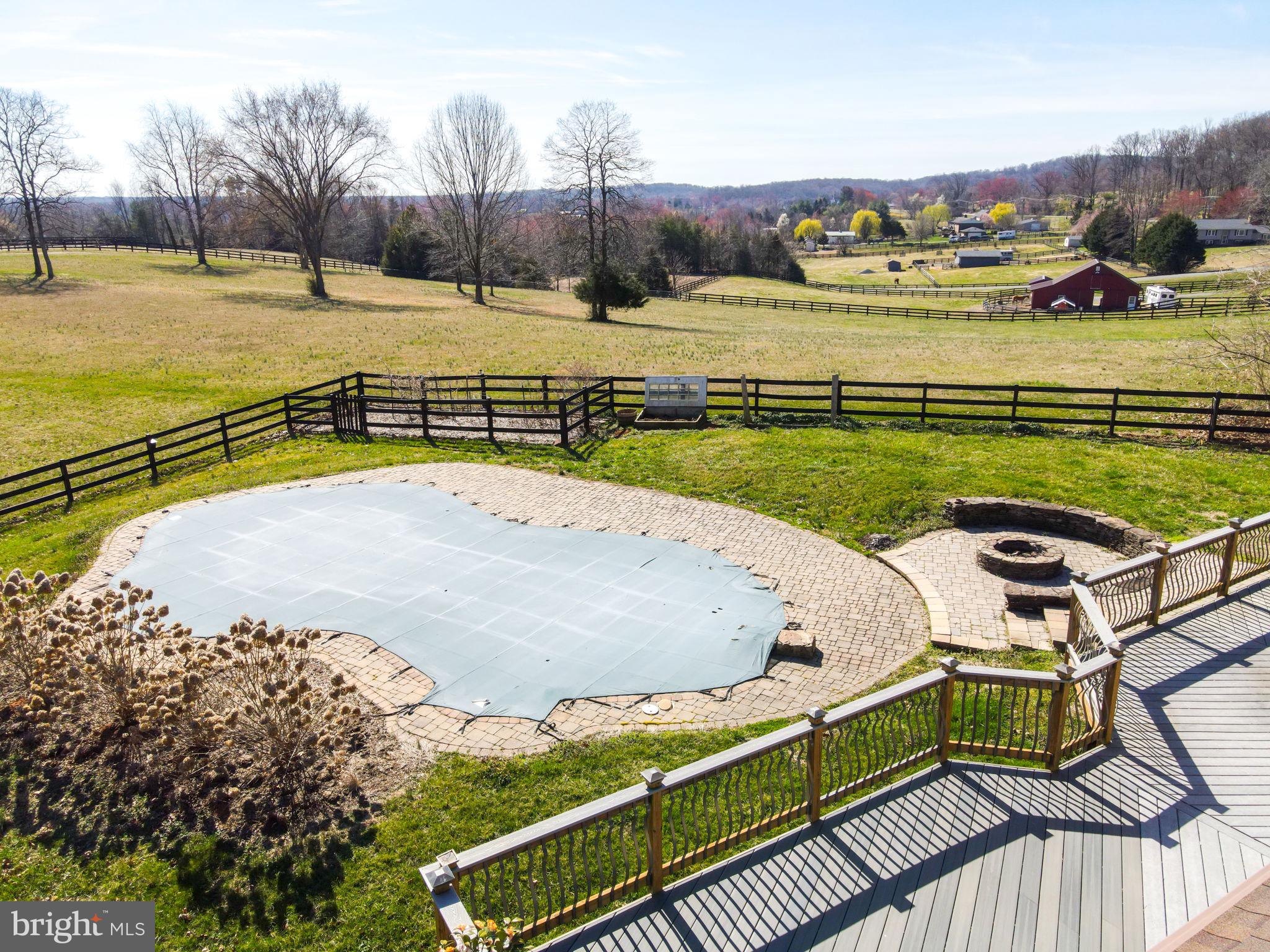 6239 Beverleys Mill Road Broad Run, VA 20137 - Photo 49 of 70 trex deck with pool and firepit
