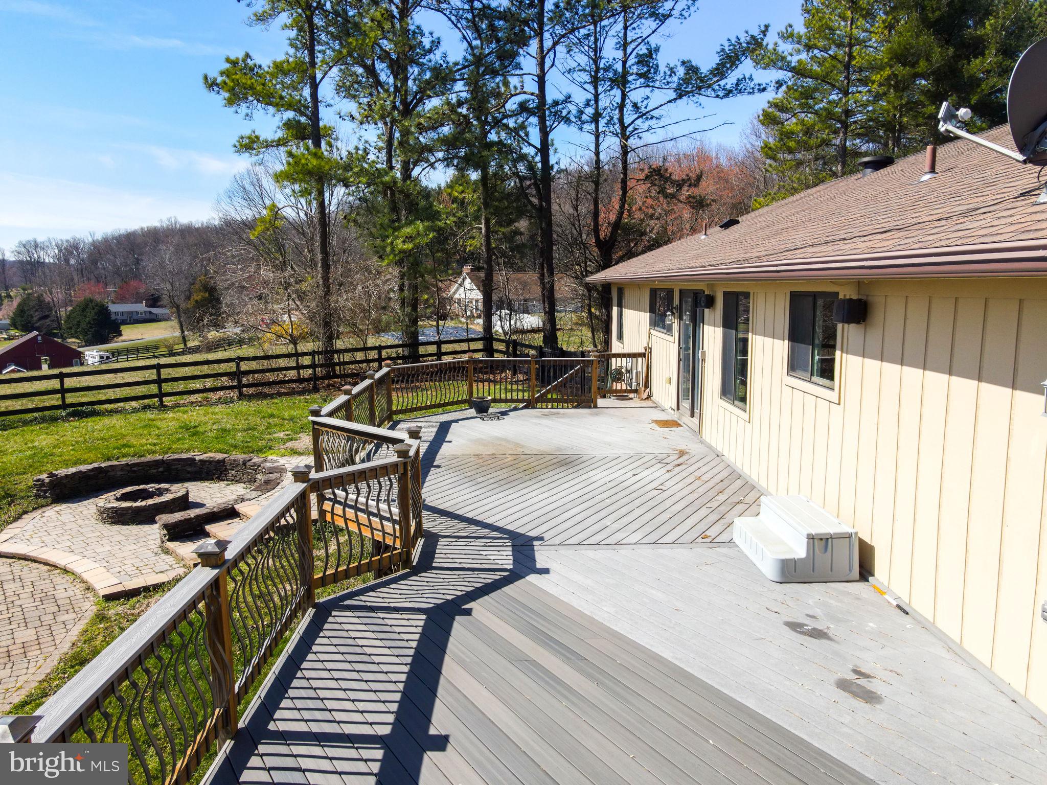 6239 Beverleys Mill Road Broad Run, VA 20137 - Photo 52 of 70 long trex deck spans back of house