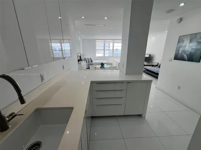 a view of a living room and dining room