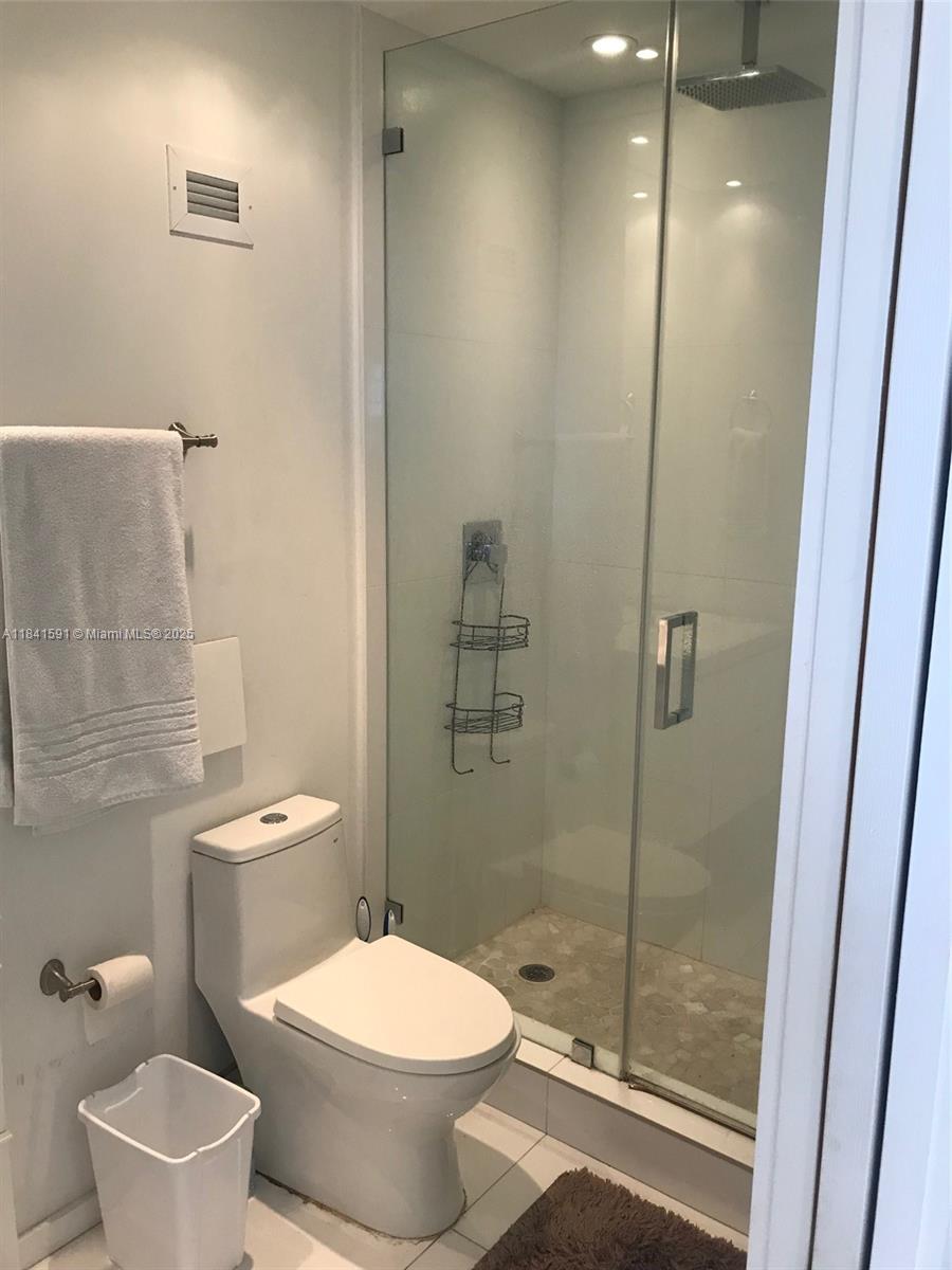 100 Lincoln Road, Unit 1601 Miami Beach, FL 33139 - Photo 18 of 57 a bathroom with a toilet and a shower