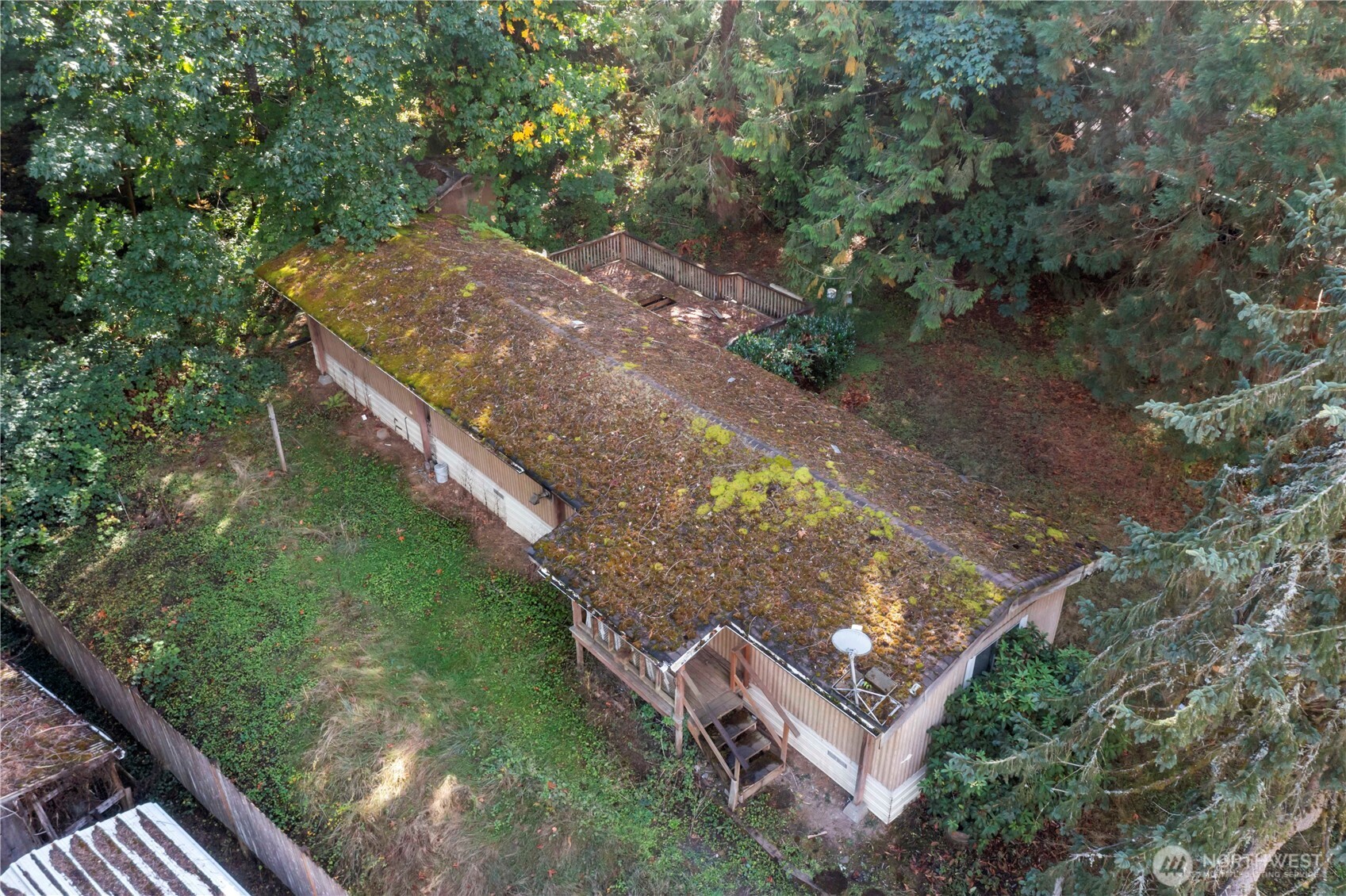 5128 335th Lane Southeast Fall City, WA 98024 - Photo 11 of 36 a view of a wooden house with a yard