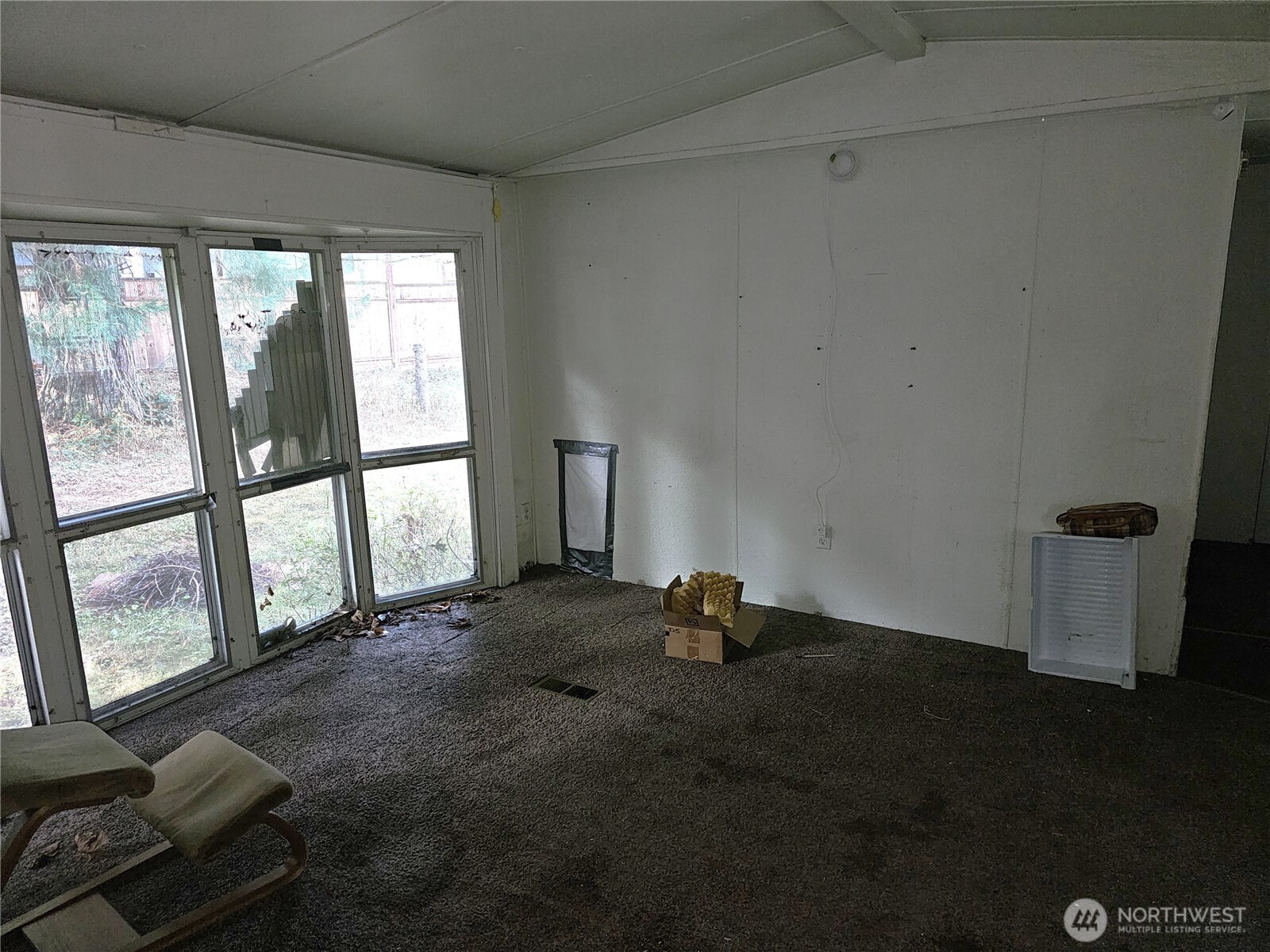 5128 335th Lane Southeast Fall City, WA 98024 - Photo 22 of 36 a view of a room with furniture and a large window