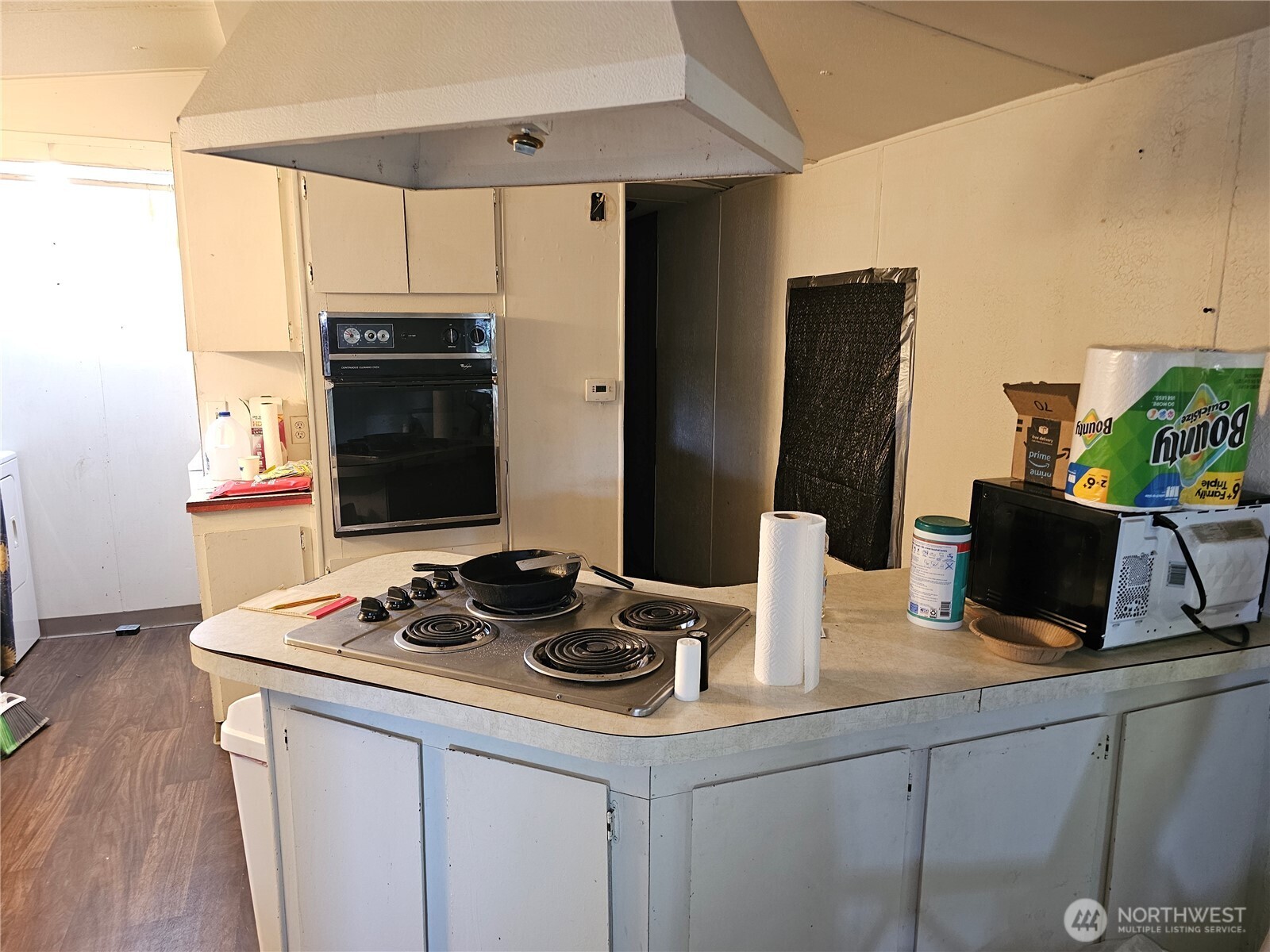 5128 335th Lane Southeast Fall City, WA 98024 - Photo 23 of 36 a kitchen with a sink stove and refrigerator