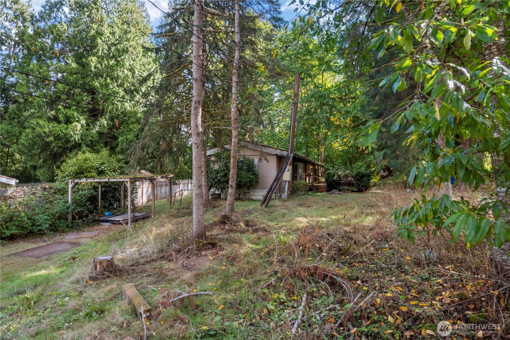 5128 335th Lane Southeast Fall City, WA 98024 - Photo 3 of 36 a backyard of a house with seating space