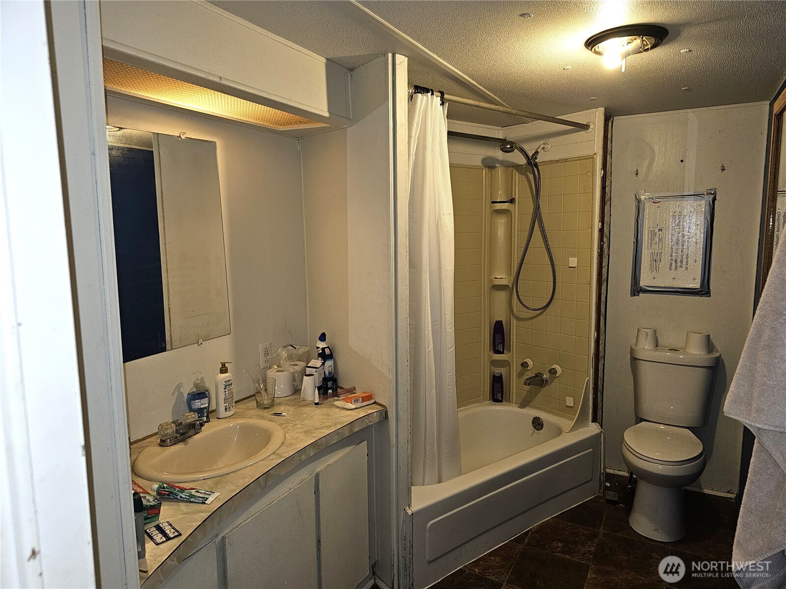 5128 335th Lane Southeast Fall City, WA 98024 - Photo 31 of 36 a bathroom with a sink toilet and shower