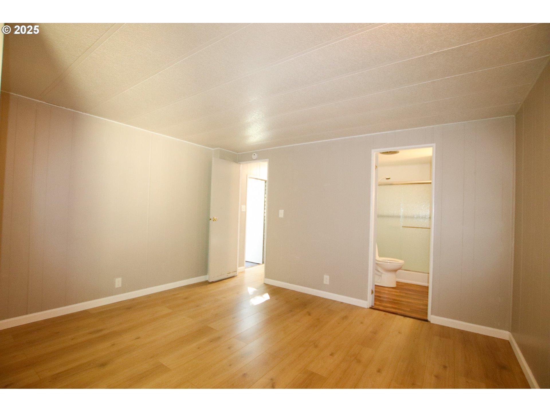 1600 Rhododendron Drive, Unit 279 Florence, OR 97439 - Photo 19 of 30 a view of an empty room and window