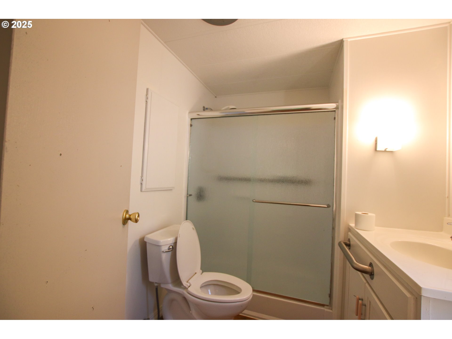 1600 Rhododendron Drive, Unit 279 Florence, OR 97439 - Photo 20 of 30 a bathroom with a shower and a toilet