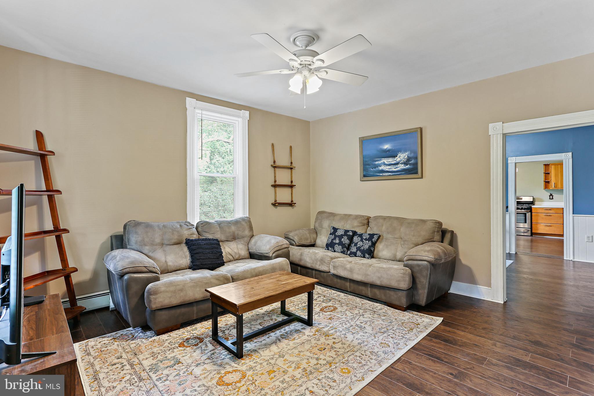 8560 Frederick Road Ellicott City, MD 21043 - Photo 6 of 31 Living Room with Ceiling Fan