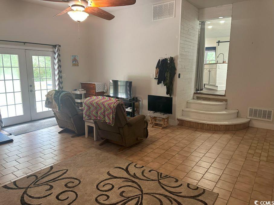 214 Rum Bluff Boulevard Longs, SC 29568 - Photo 13 of 36 French doors and ceiling fan