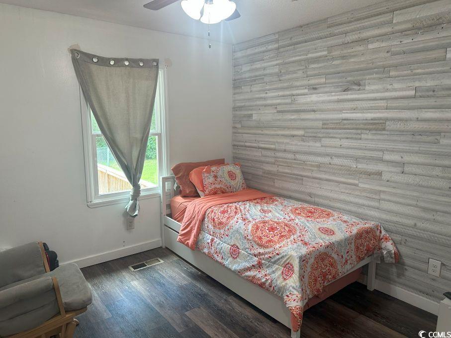 214 Rum Bluff Boulevard Longs, SC 29568 - Photo 19 of 36 Bedroom with wood finished floors and ceiling fan