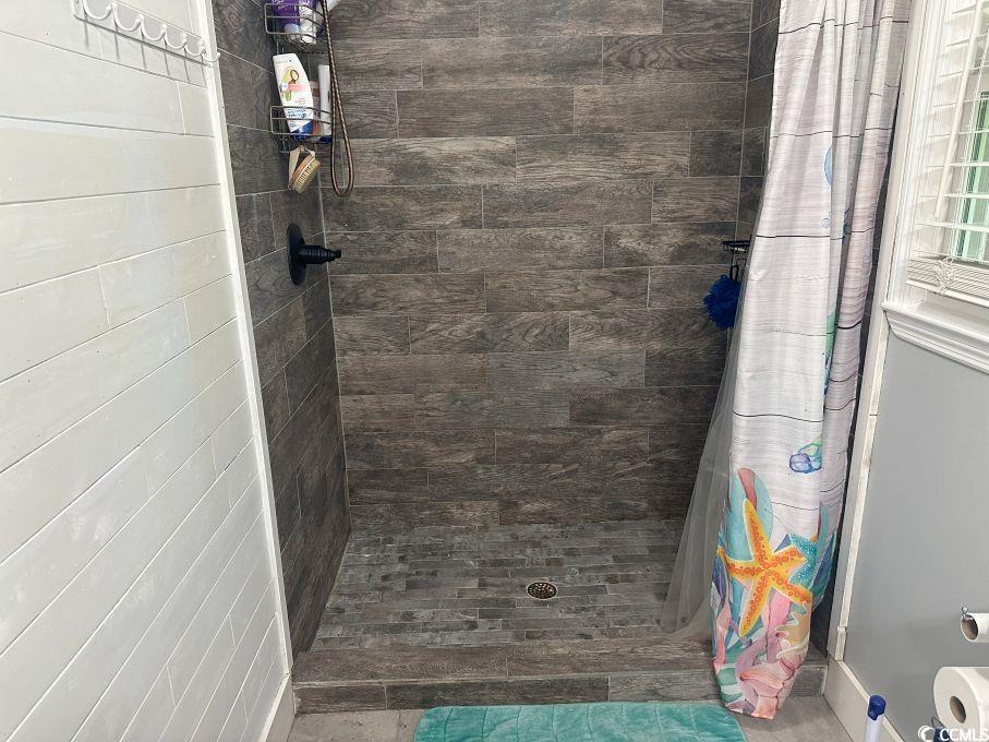 214 Rum Bluff Boulevard Longs, SC 29568 - Photo 27 of 36 Bathroom featuring tile walk in shower.