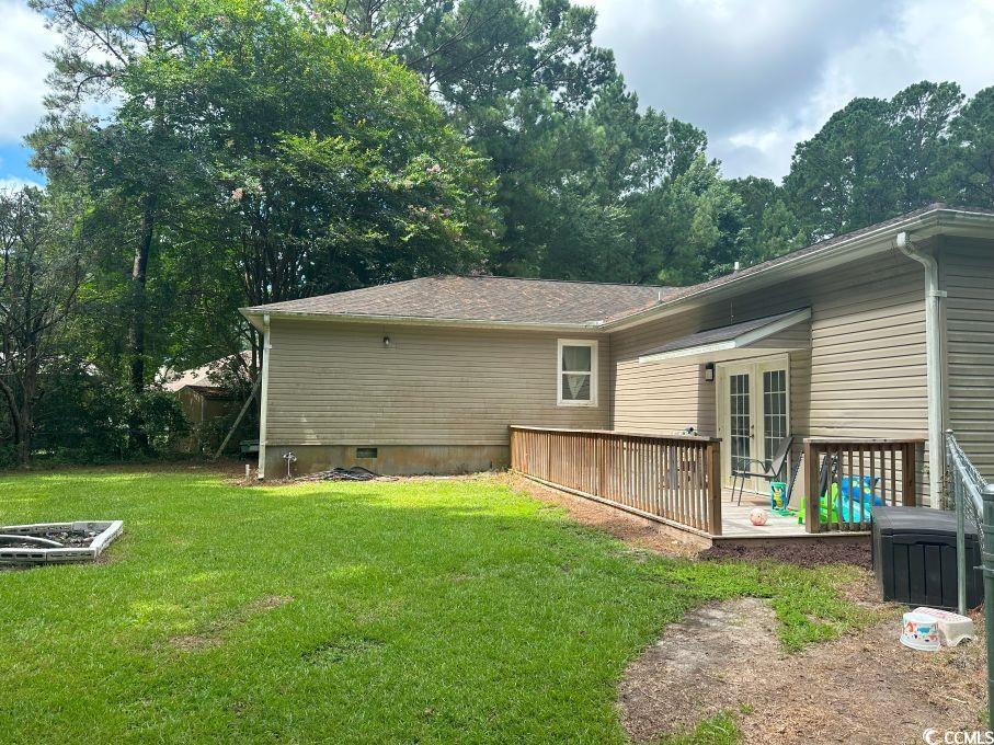 214 Rum Bluff Boulevard Longs, SC 29568 - Photo 33 of 36 Rear view of property with french doors, a yard, a