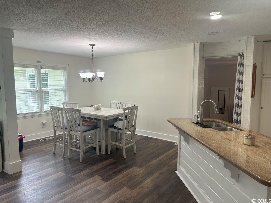 214 Rum Bluff Boulevard Longs, SC 29568 - Photo 5 of 36 Dining room featuring dark wood-type flooring, a c