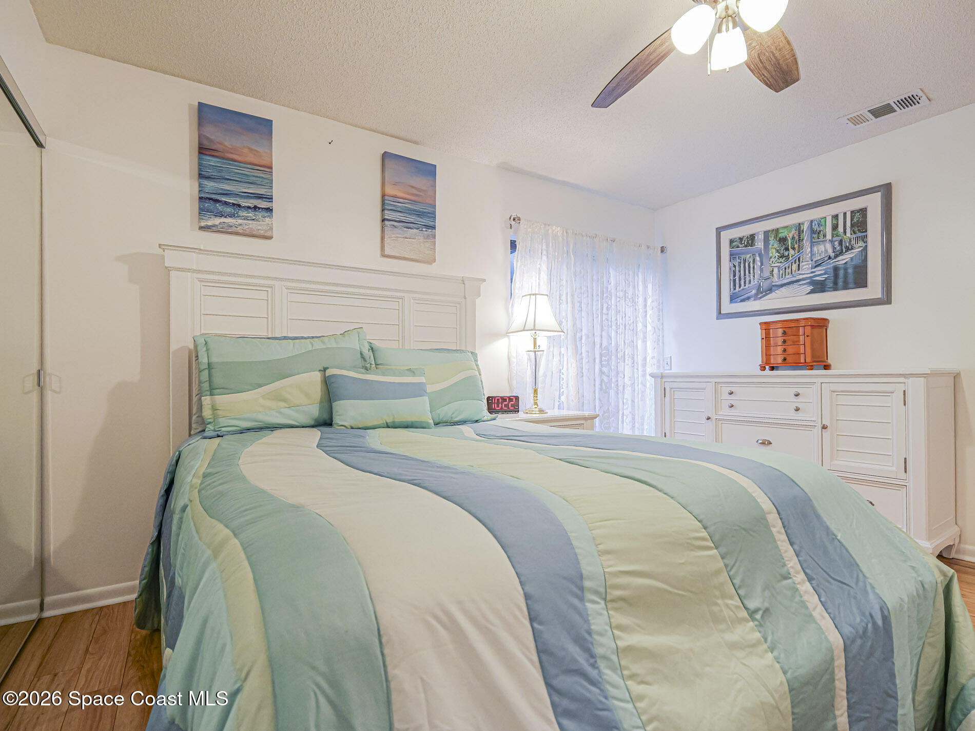 1198 Breezy Way, Unit 7 Sebastian, FL 32958 - Photo 15 of 34 a bedroom with bed and window