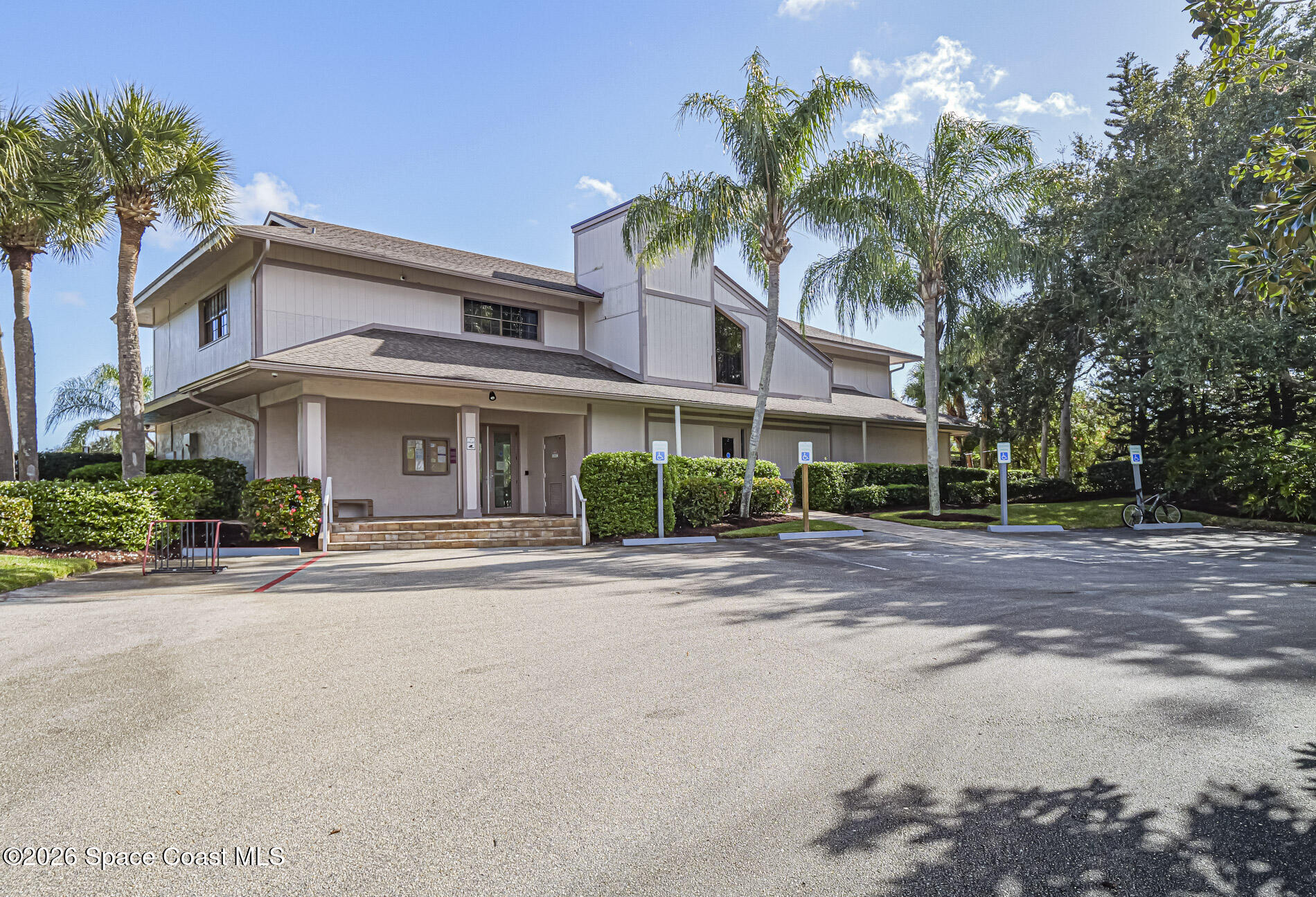 1198 Breezy Way, Unit 7 Sebastian, FL 32958 - Photo 24 of 34 a front view of multiple houses with yard