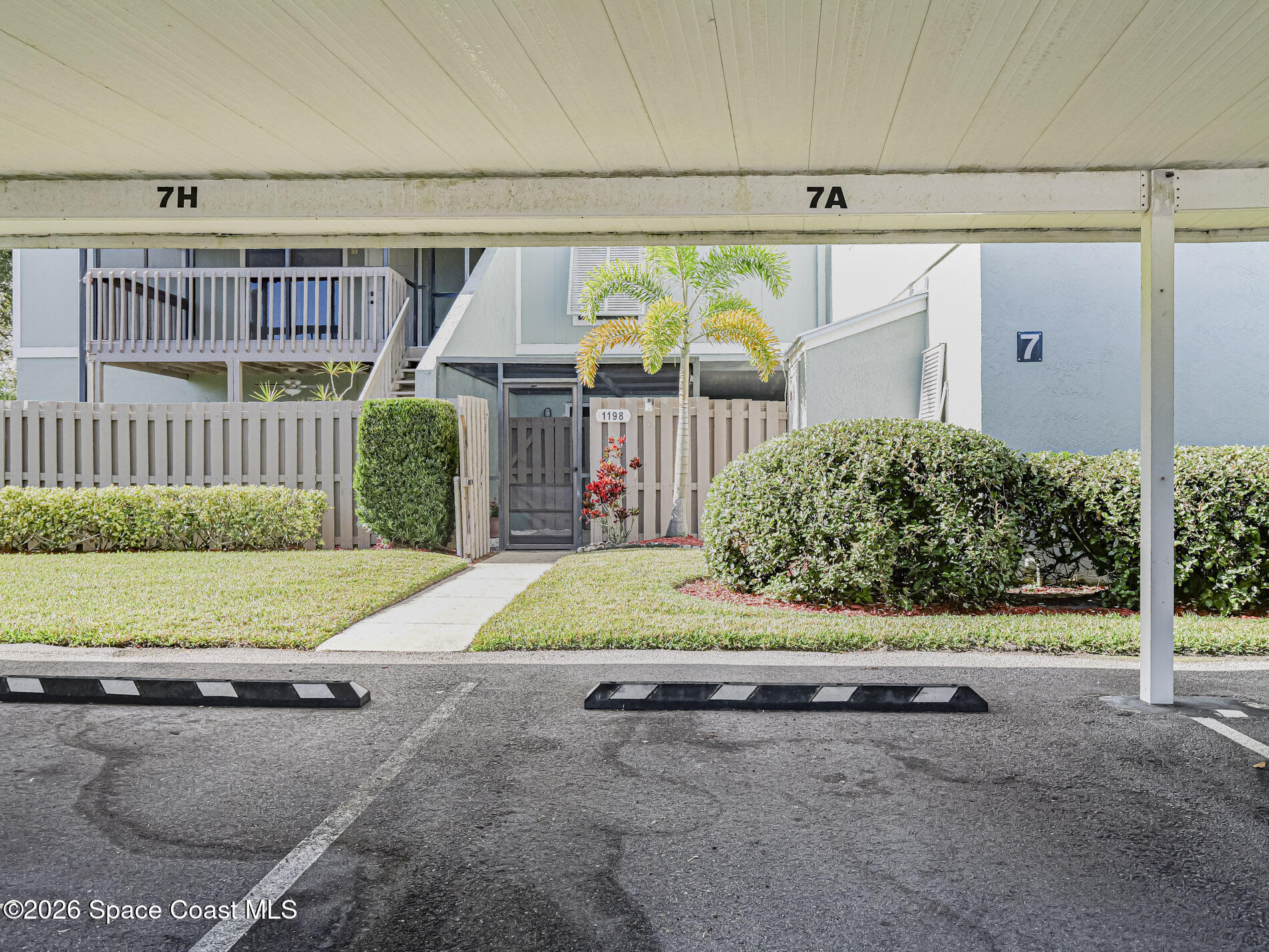 1198 Breezy Way, Unit 7 Sebastian, FL 32958 - Photo 3 of 34 a view of outdoor space and deck
