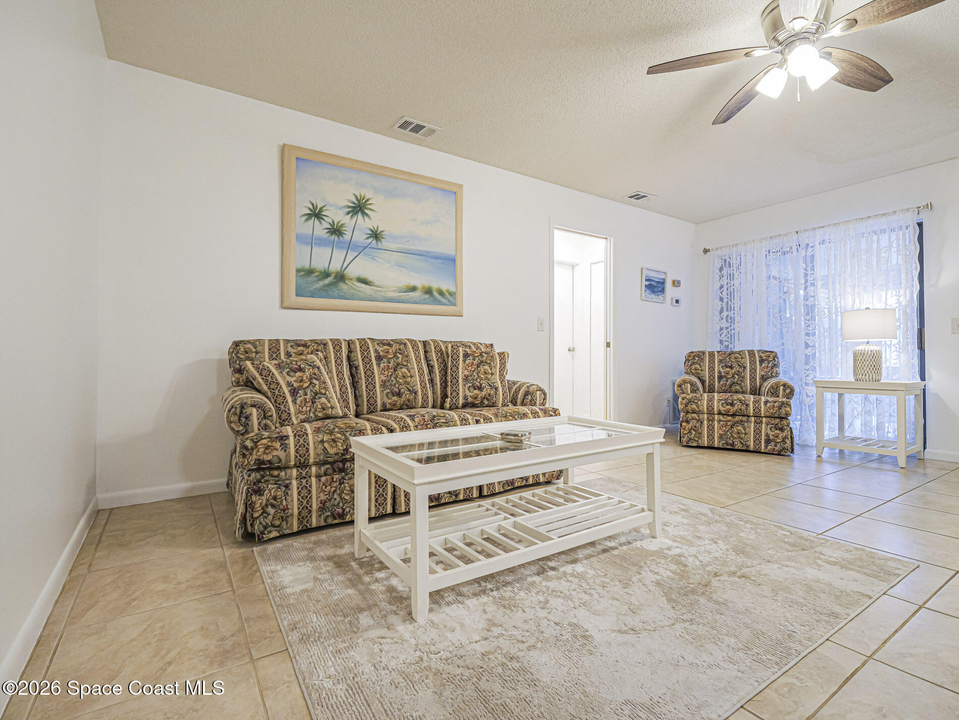 1198 Breezy Way, Unit 7 Sebastian, FL 32958 - Photo 5 of 34 a living room with furniture