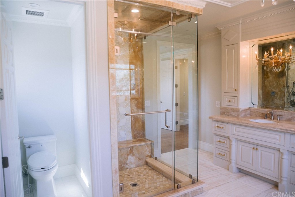 1122 Drake Road Arcadia, CA 91007 - Photo 12 of 30 a bathroom with a granite countertop sink toilet and shower
