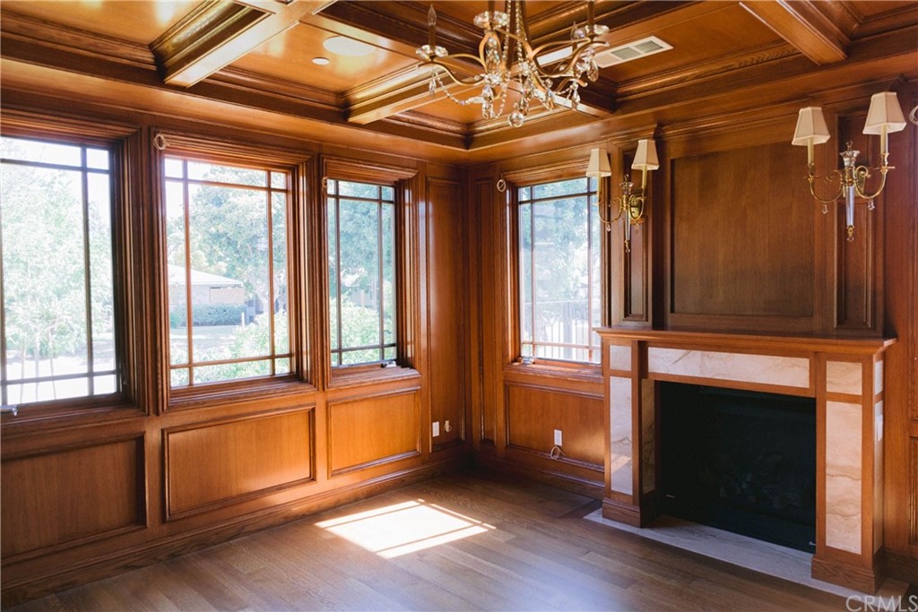1122 Drake Road Arcadia, CA 91007 - Photo 13 of 30 a view of an empty room with a fireplace and a window