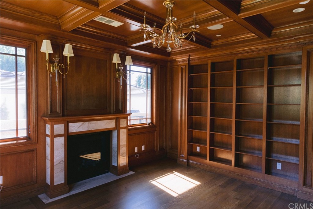 1122 Drake Road Arcadia, CA 91007 - Photo 14 of 30 a view of an empty room with a fireplace and a window