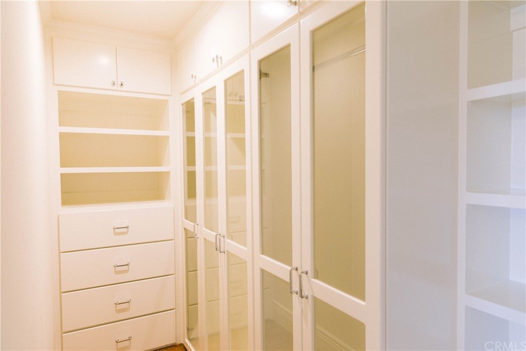 1122 Drake Road Arcadia, CA 91007 - Photo 17 of 30 a view of walk in closet with empty racks