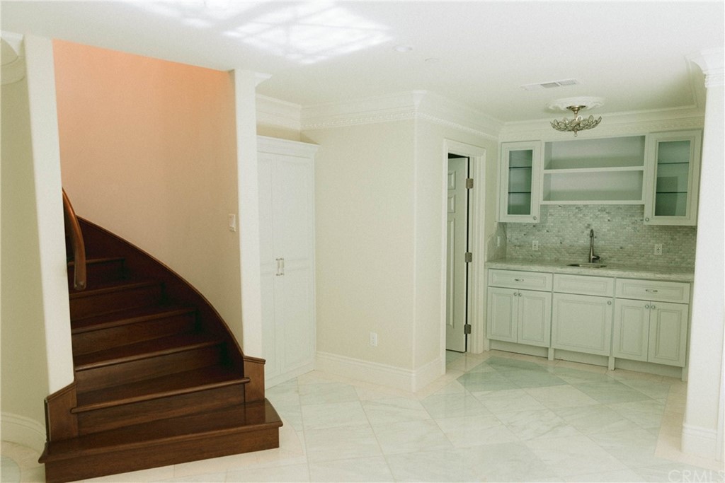 1122 Drake Road Arcadia, CA 91007 - Photo 20 of 30 a bathroom with a sink and a mirror