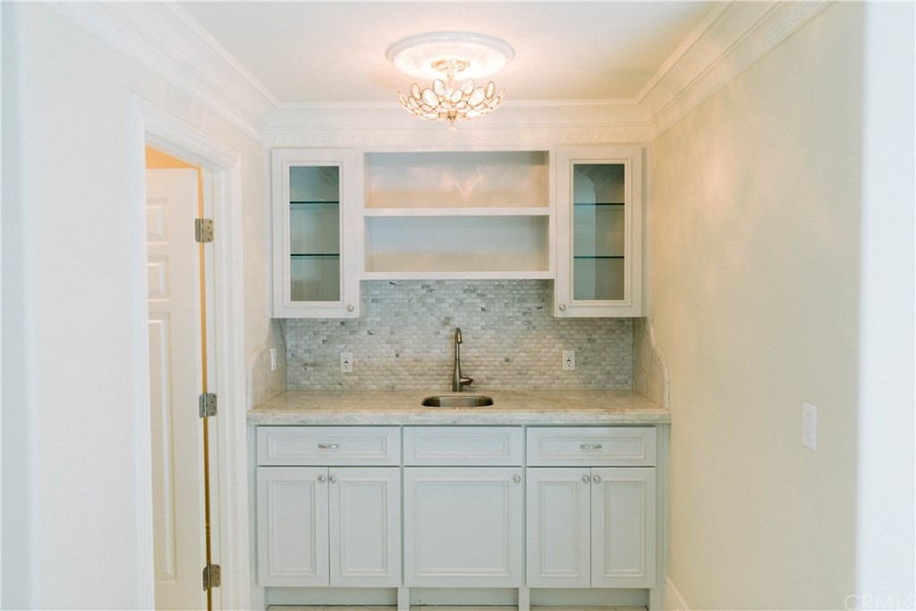 1122 Drake Road Arcadia, CA 91007 - Photo 21 of 30 a bathroom with a sink and a mirror