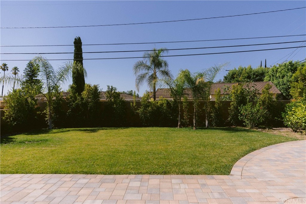 1122 Drake Road Arcadia, CA 91007 - Photo 29 of 30 a front view of a house with a garden