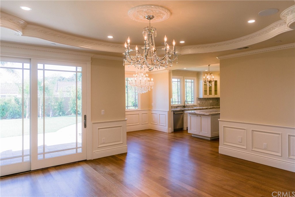 1122 Drake Road Arcadia, CA 91007 - Photo 7 of 30 a view of a big room with wooden floor and windows