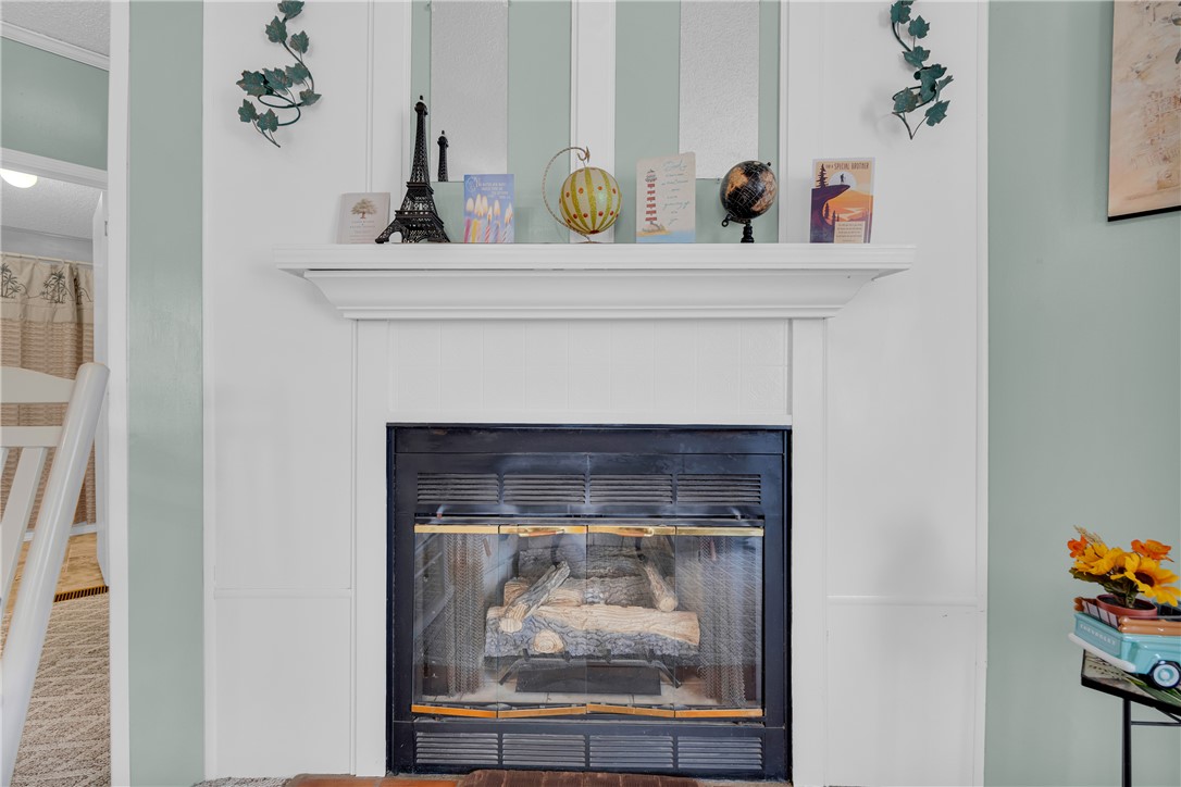 721 Cedar Crest Trail Walhalla, SC 29691 - Photo 21 of 47 A well-appointed fireplace creates a cozy focal point for the living space.
