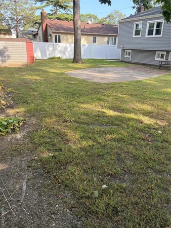 a view of a house with a big yard