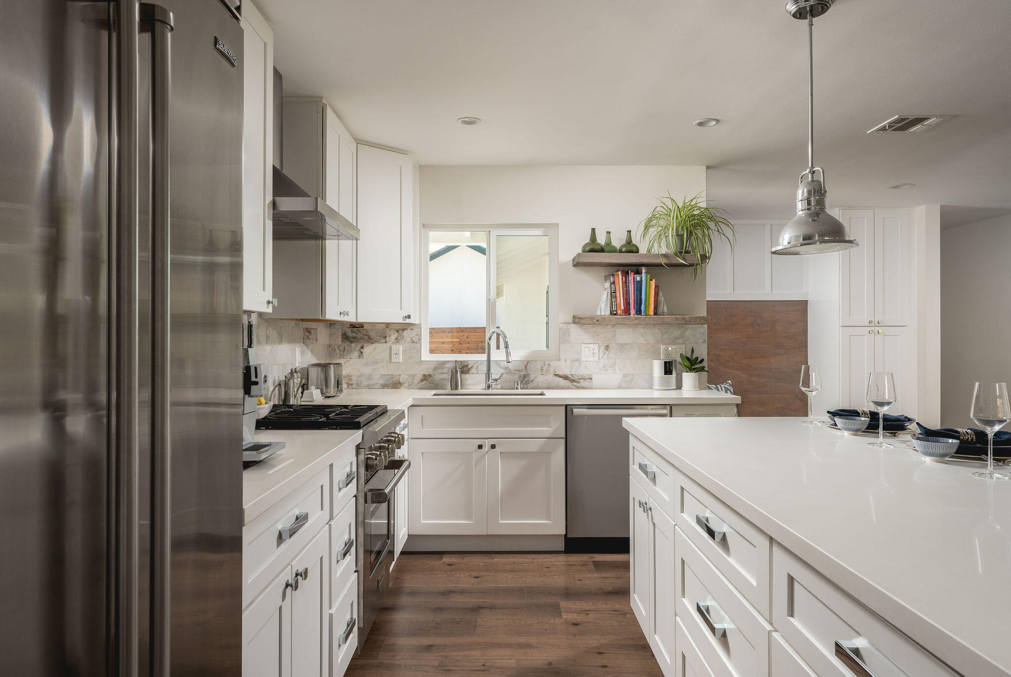 571 Windsor Avenue Goleta, CA 93117 - Photo 17 of 43 a kitchen with a sink stove and refrigerator