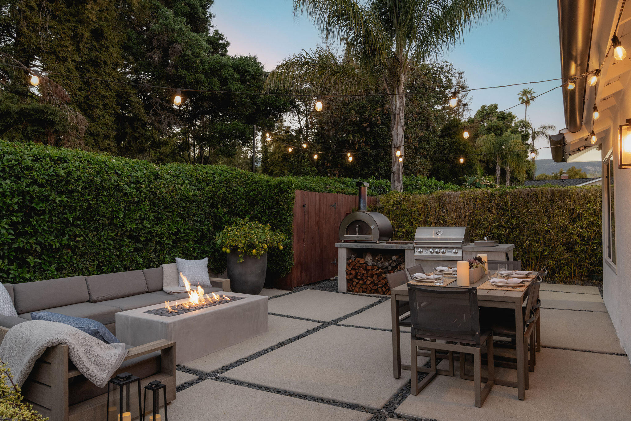 571 Windsor Avenue Goleta, CA 93117 - Photo 2 of 43 a view of a patio with a table and chairs and a barbeque
