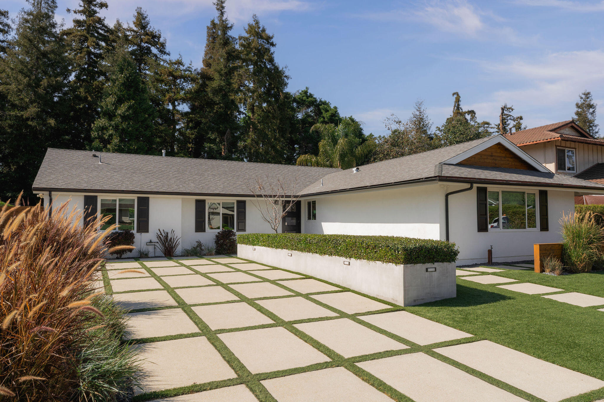571 Windsor Avenue Goleta, CA 93117 - Photo 4 of 43 a front view of a house with a yard and potted plants