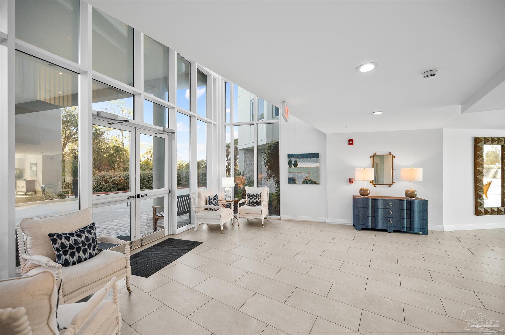 28250 Canal Road, Unit 205 Orange Beach, AL 36561 - Photo 45 of 60 a living room with furniture and a large window