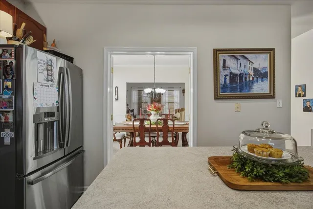 a kitchen with stainless steel appliances granite countertop a stove sink and microwave