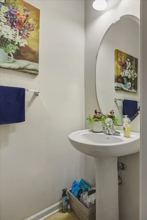 a living room with furniture a rug and a large window