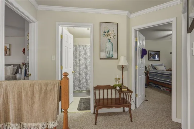 a view of a patio with table and chairs with wooden floor and fence
