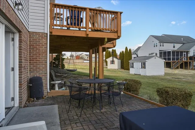 a bathroom with a sink toilet and mirror