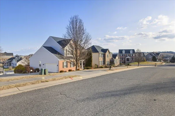 a street view with large house