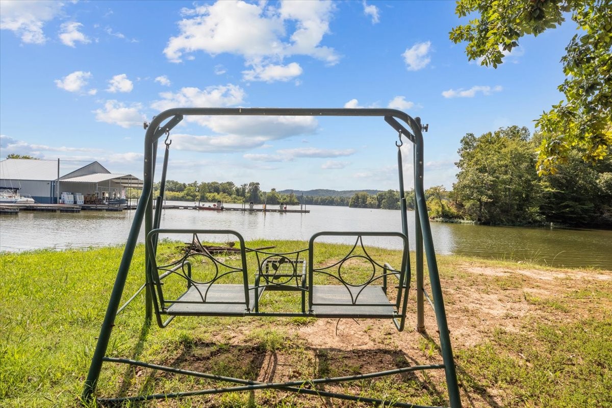0 Cuba Landing Road Waverly, TN 37185 - Photo 19 of 22 a view of swimming pool with a table and chairs