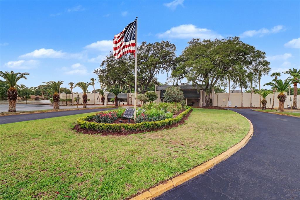 3661 Trophy Boulevard, Unit 3661 New Port Richey, FL 34655 - Photo 23 of 25 a view of a playground with basketball court